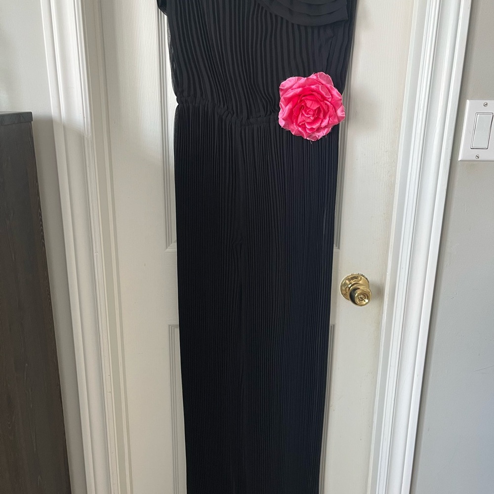 Poleci Black Jumpsuit with Removable Pink Flower Accent